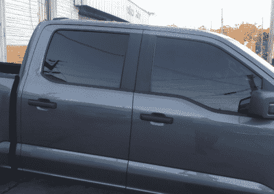 Ford F-150 truck with dark window tint